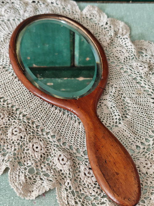 antique wooden oval hand mirror 