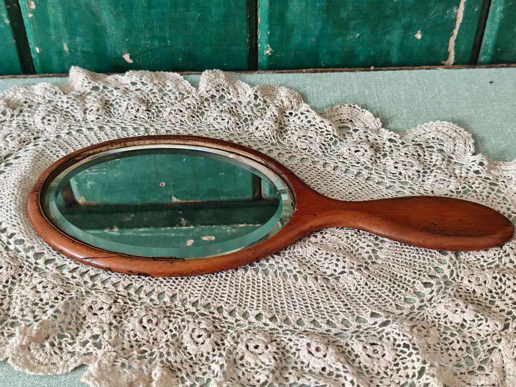 antique wooden oval hand mirror 