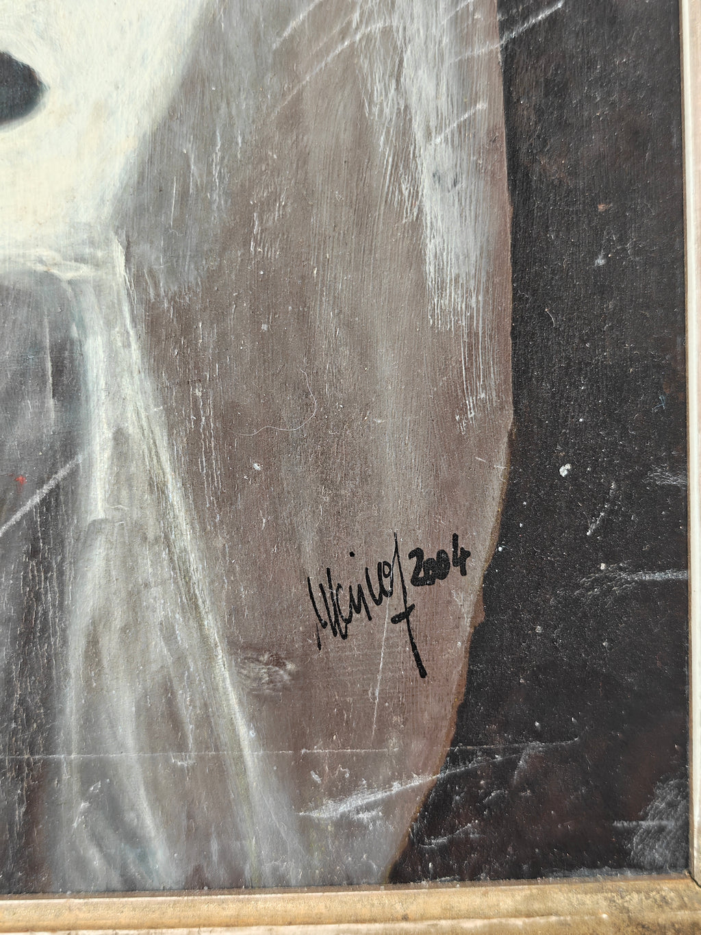 Close-up of a signature on an artwork