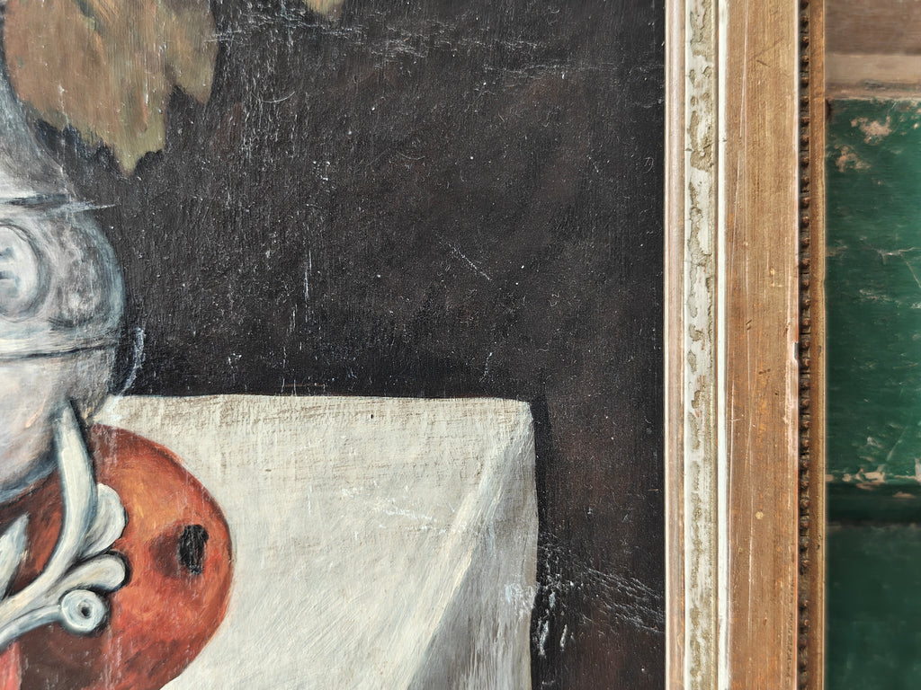 Close-up of a painting showing an object on a table