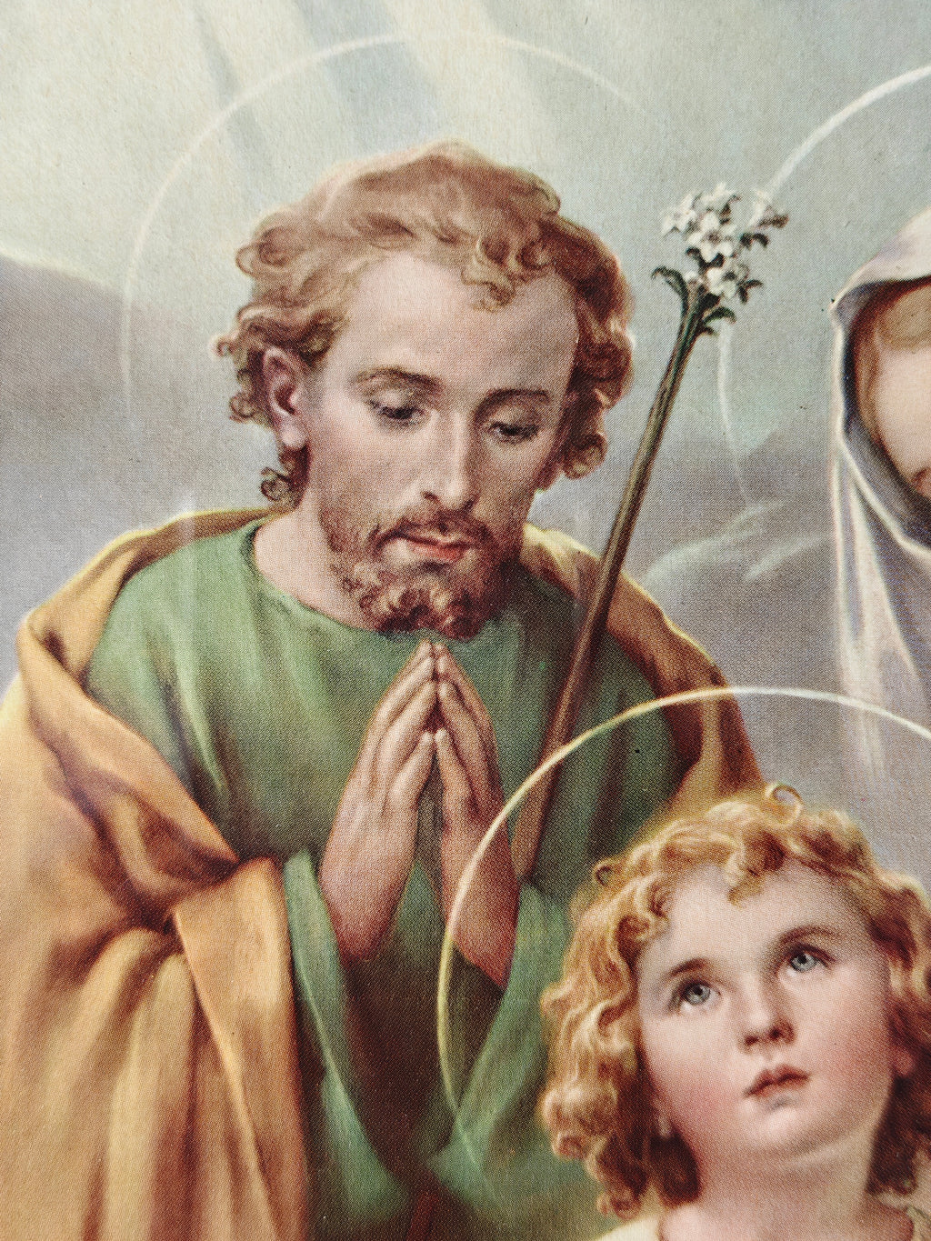 Detail of a colour print of the Holy Family