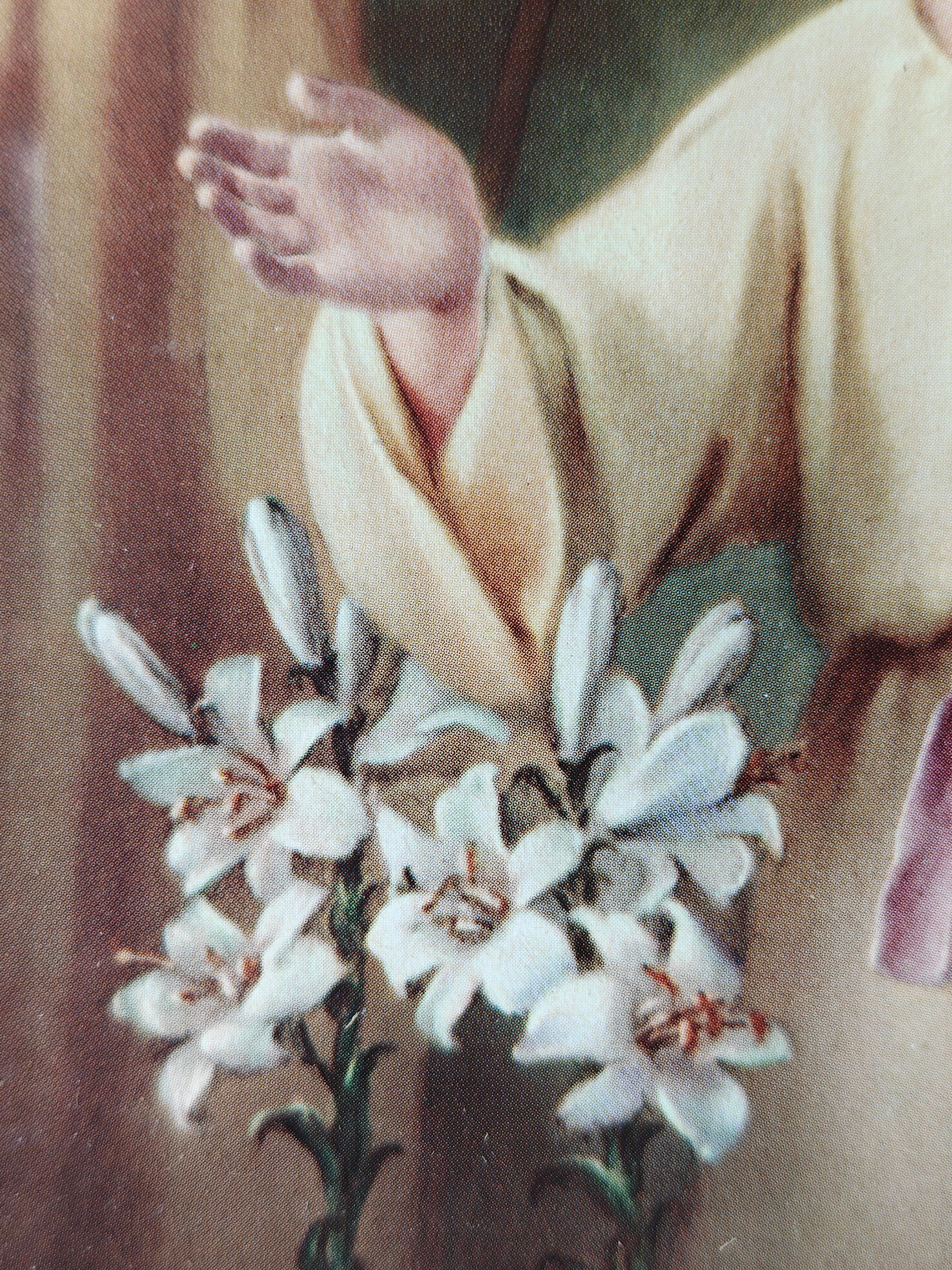 Detail of a colour print of the Holy Family