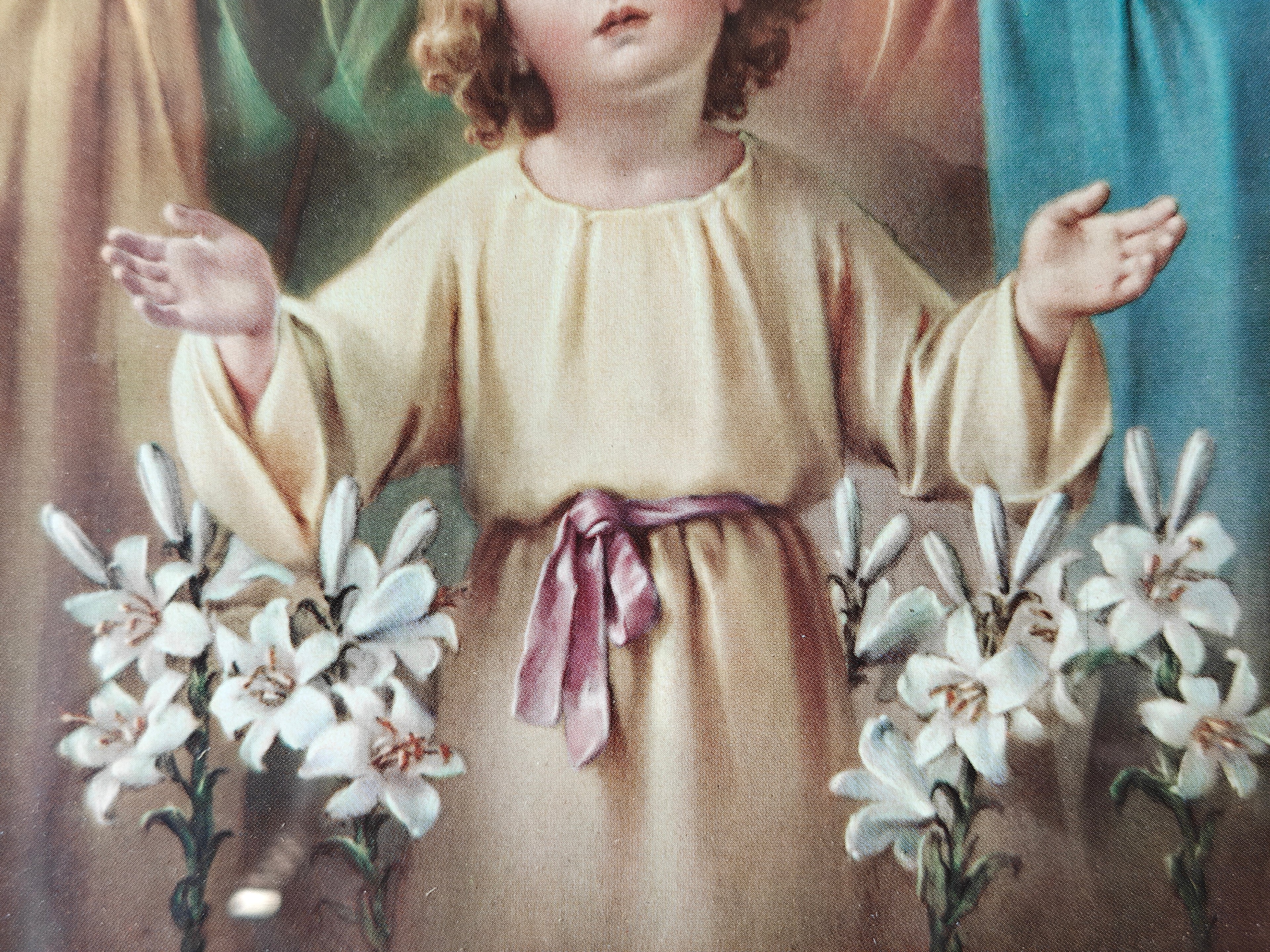 Detail of a colour print of the Holy Family