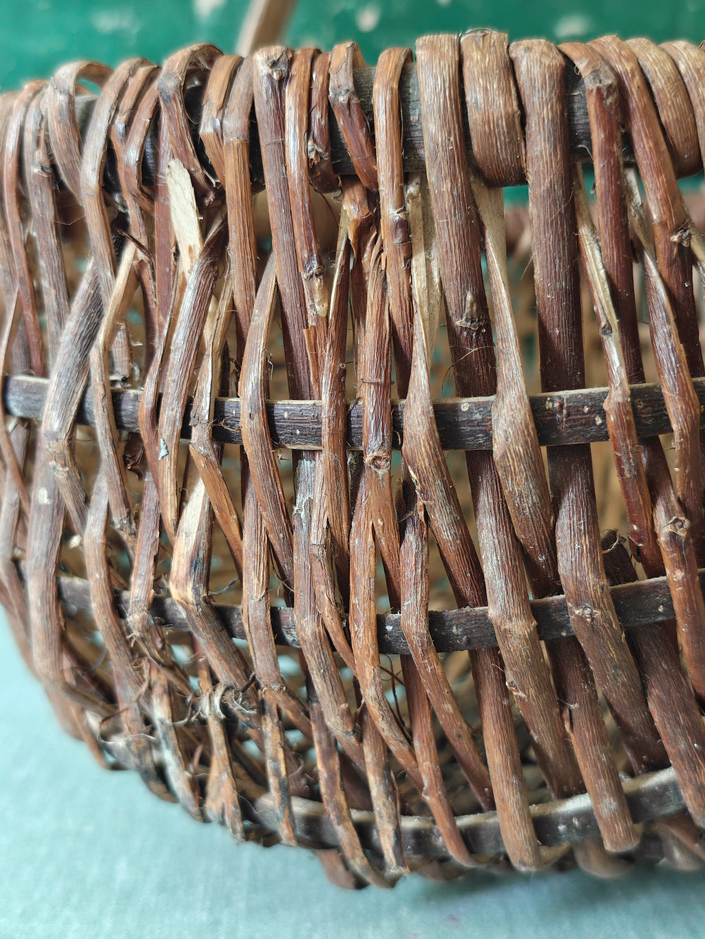 close-up of a vintage woven willow wicker basket