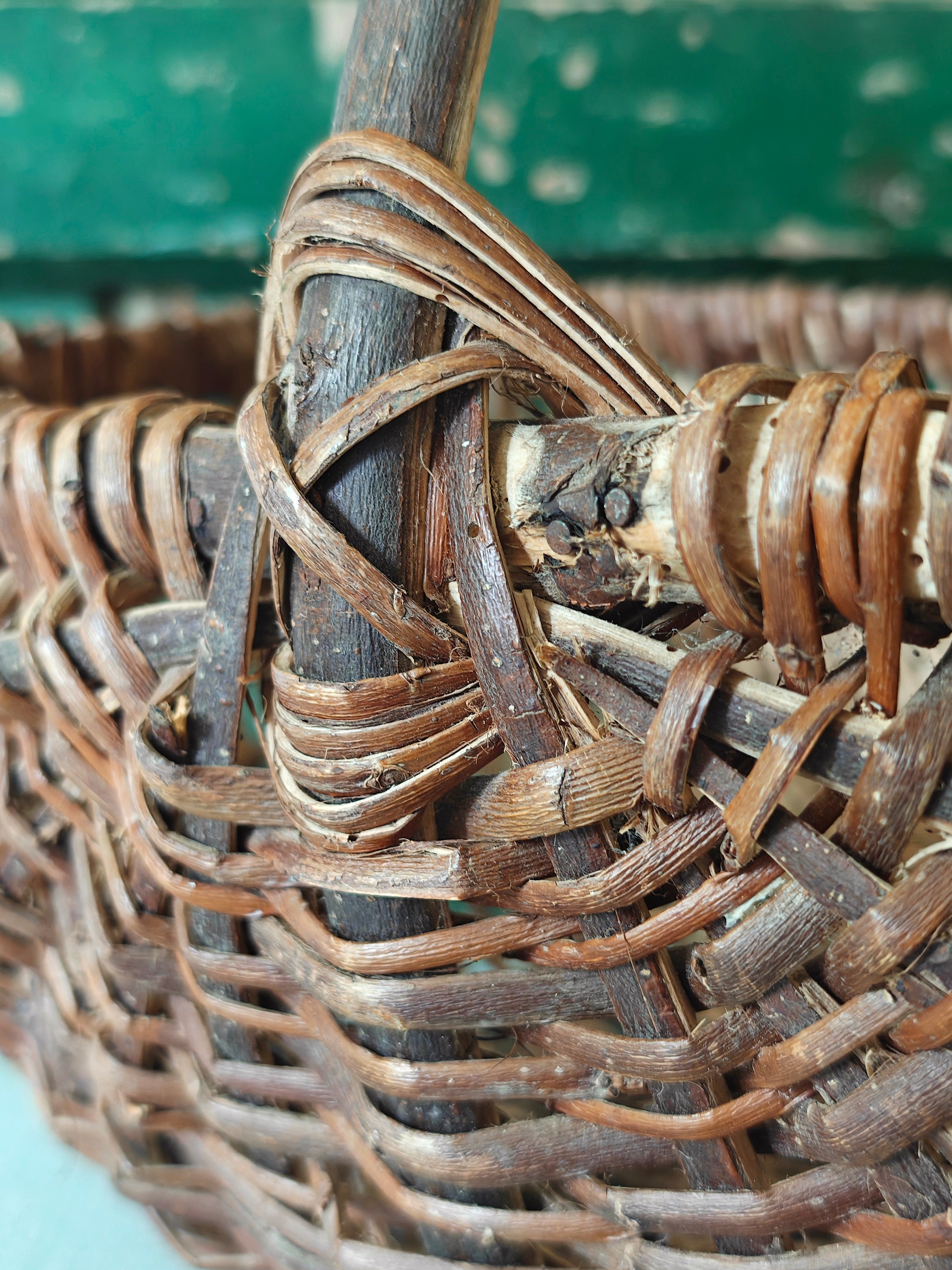close-up of a vintage woven willow wicker basket