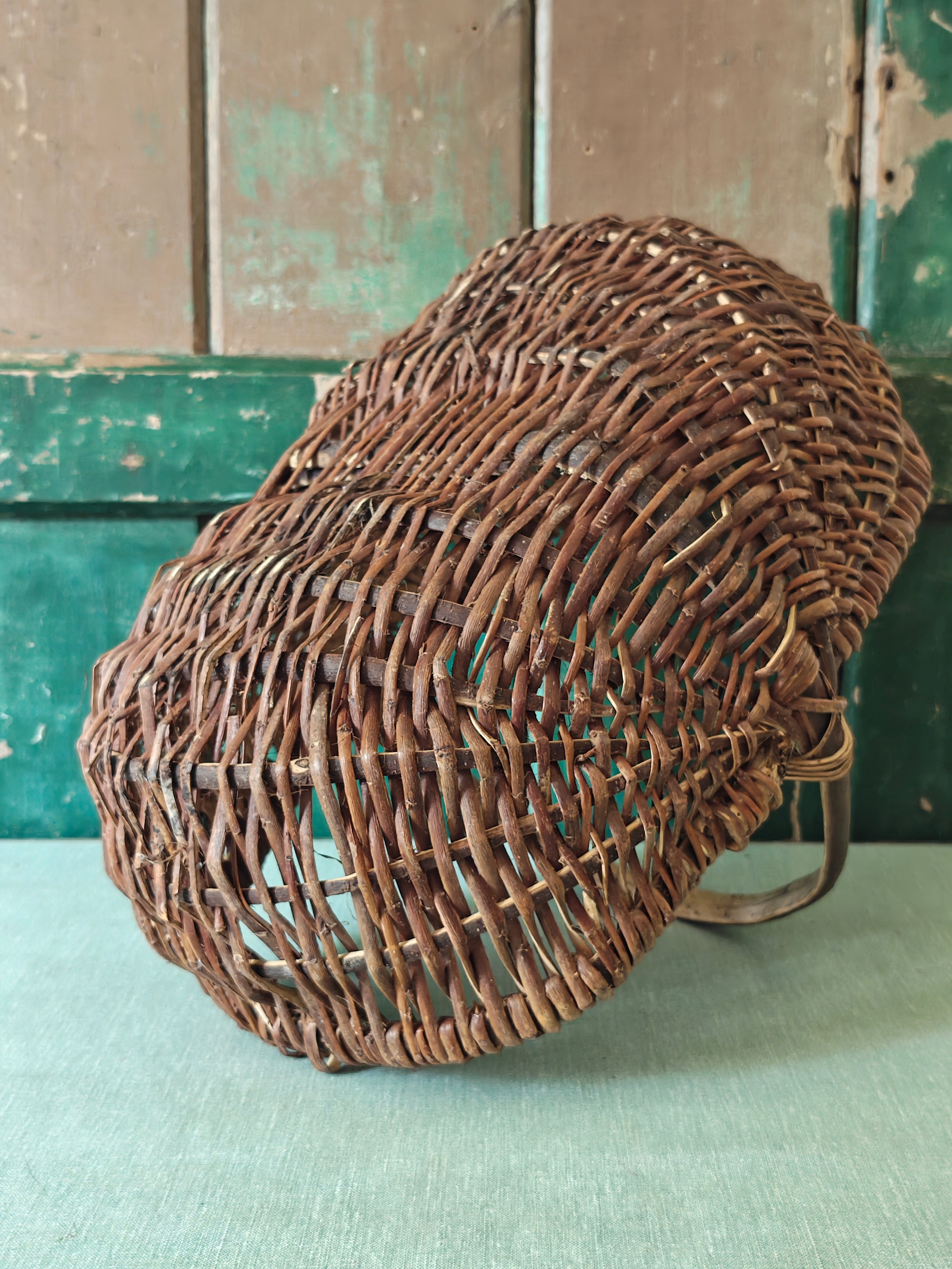 Underside of a woven willow wicker basket