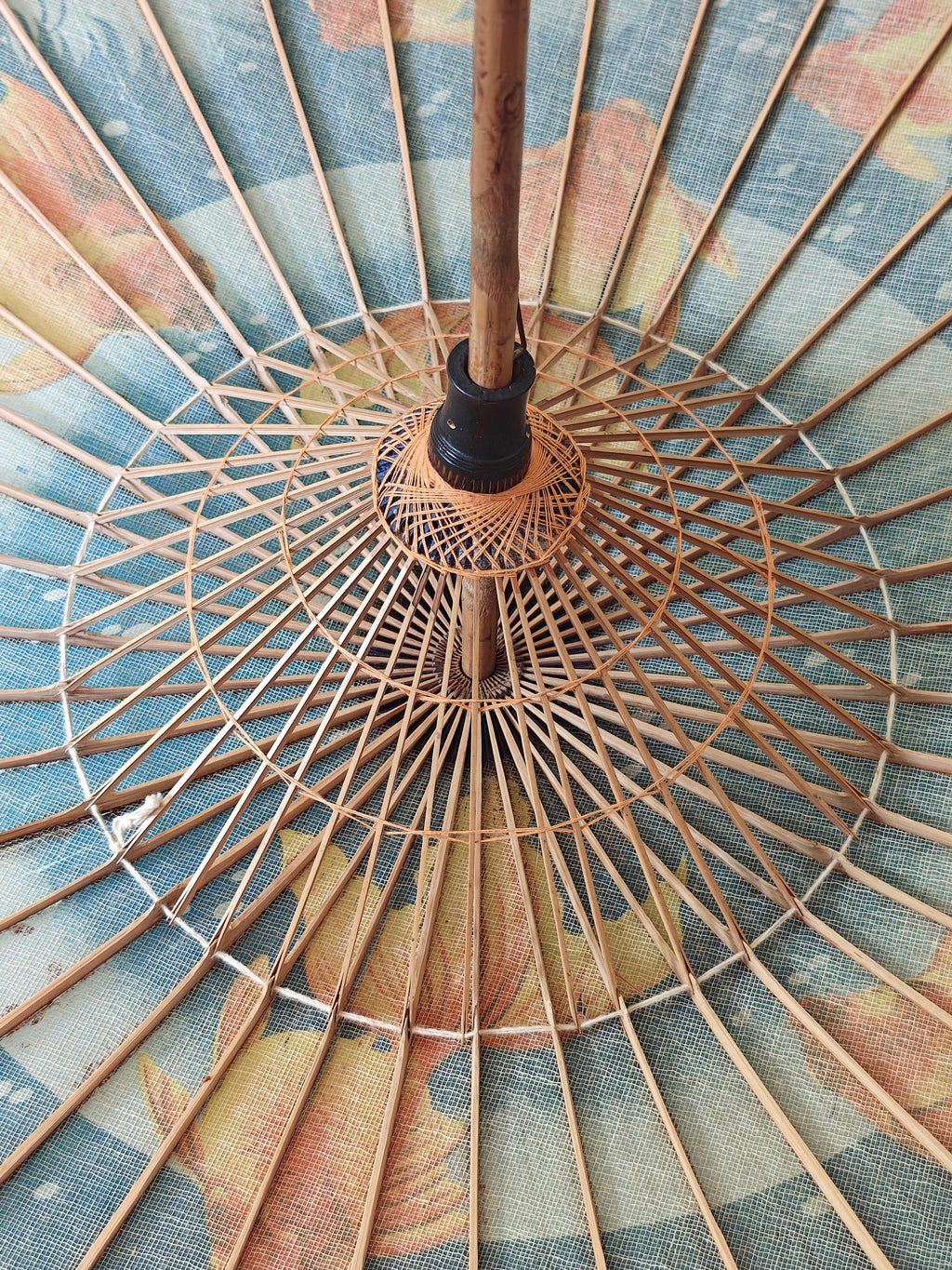 Underside of a parasol showing wooden structure