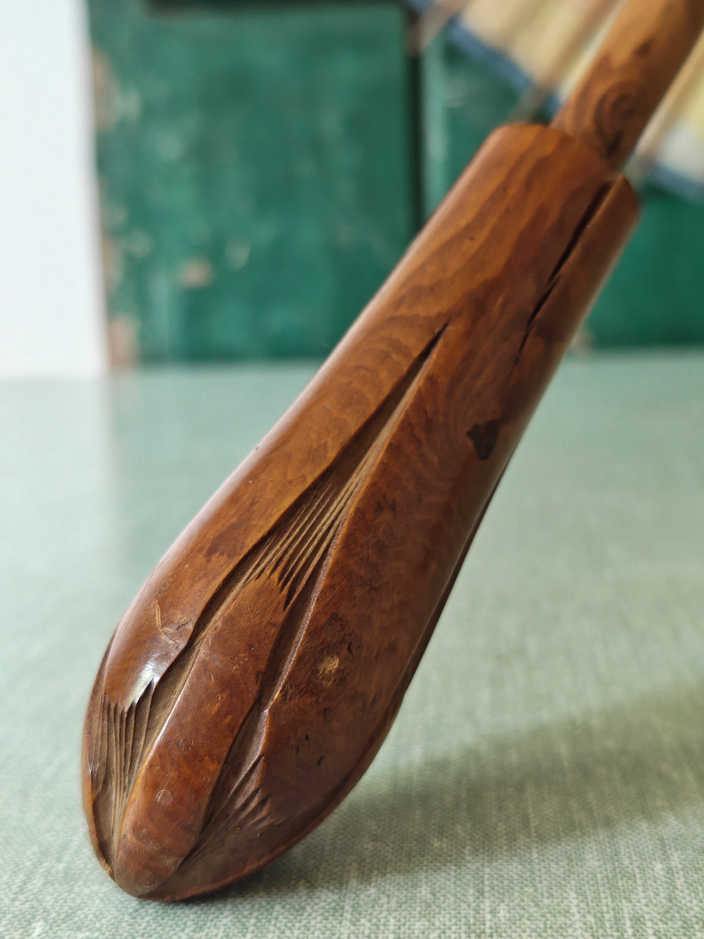 Carved wooden handle of a parasol