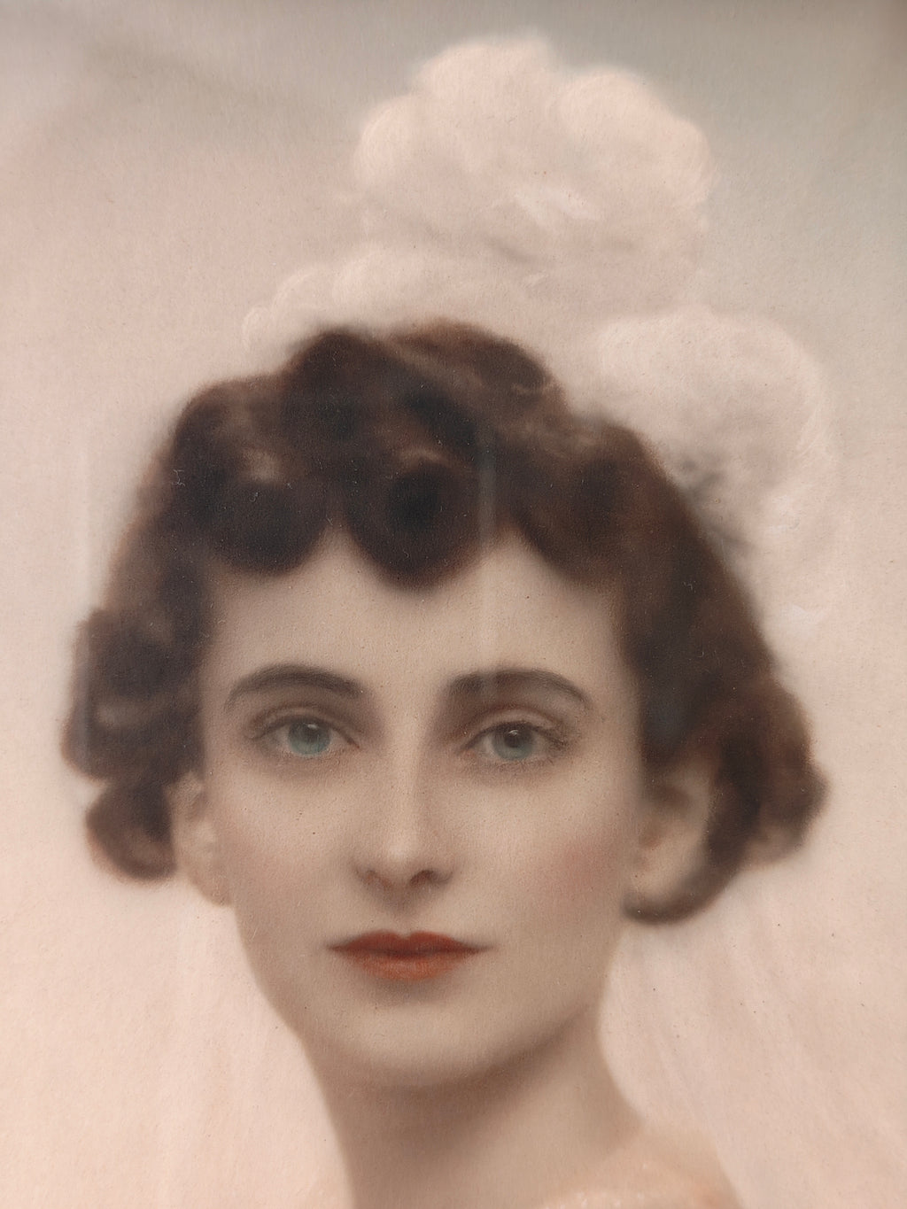 Close-up of a vintage portrait photograpy of a woman wearing a white bridal veil