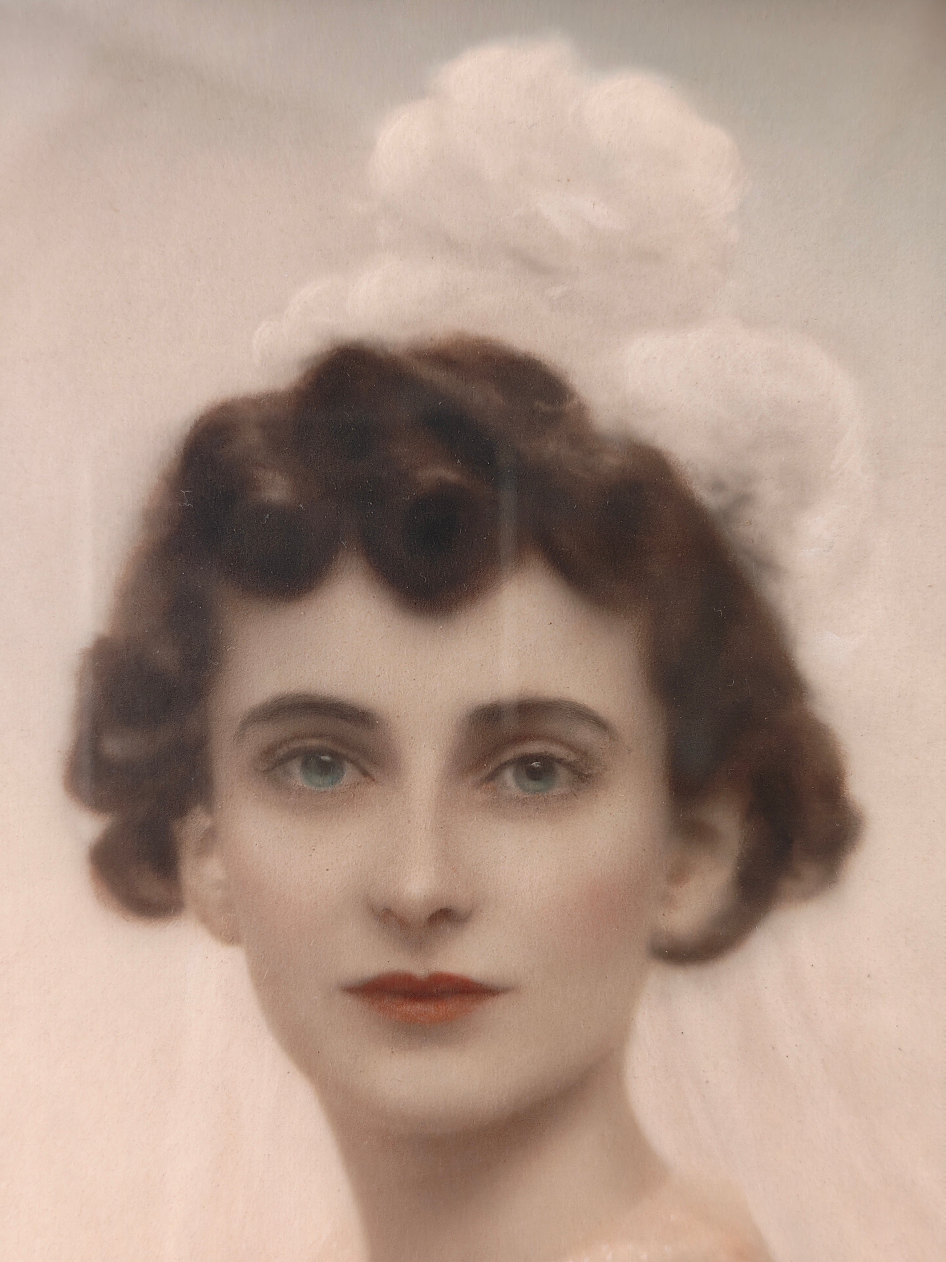 Close-up of a vintage portrait photograpy of a woman wearing a white bridal veil