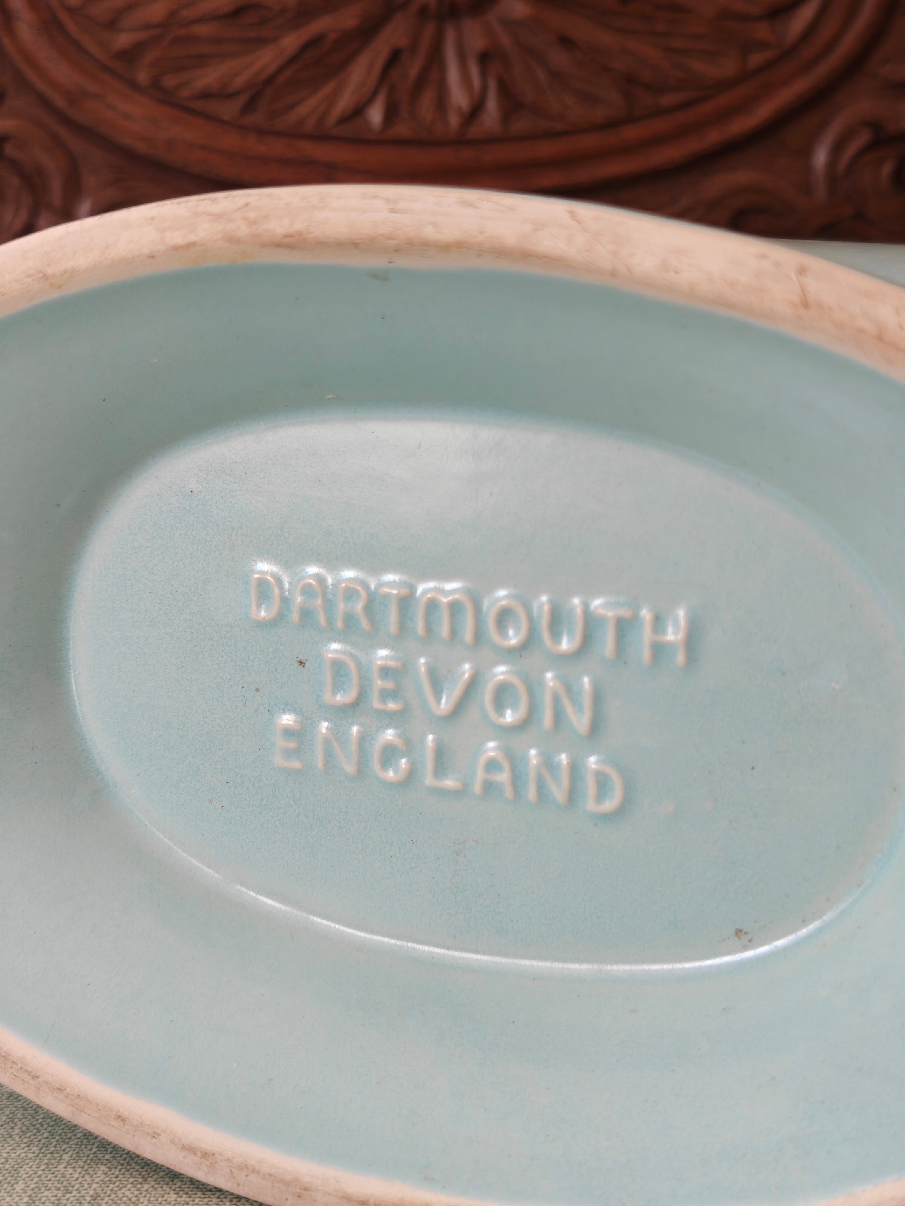 view of the underside of a vase showing the 'Dartmouth Devon England' makers mark