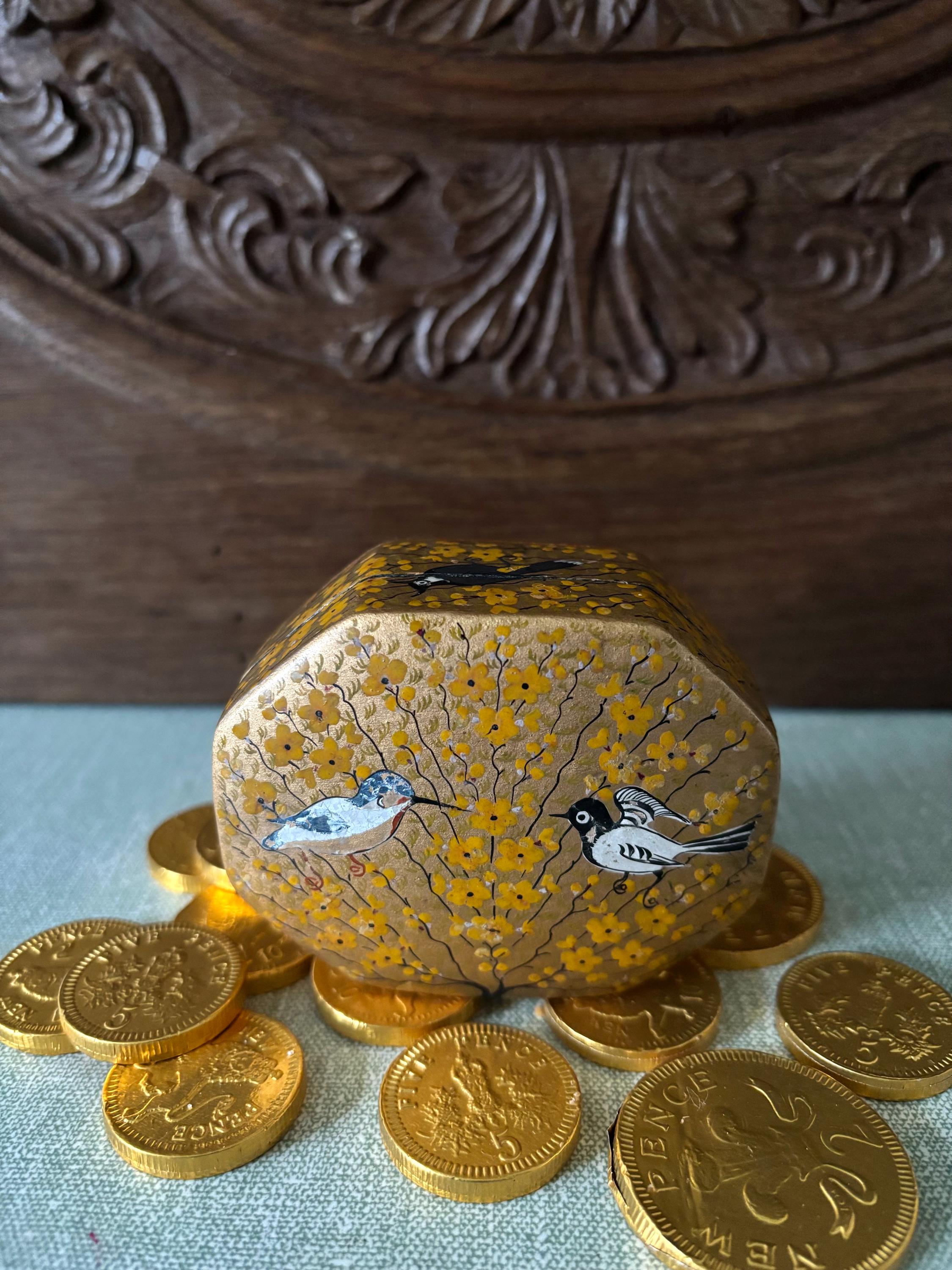 Decorative gold box with bird design 