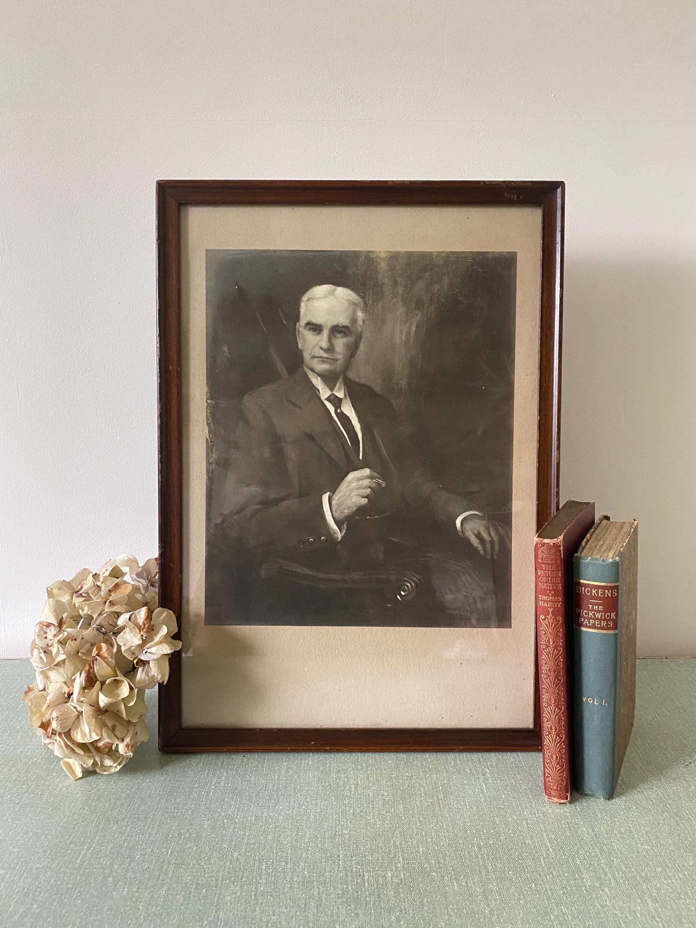 Framed black and white print of a man in Edwardian clothes