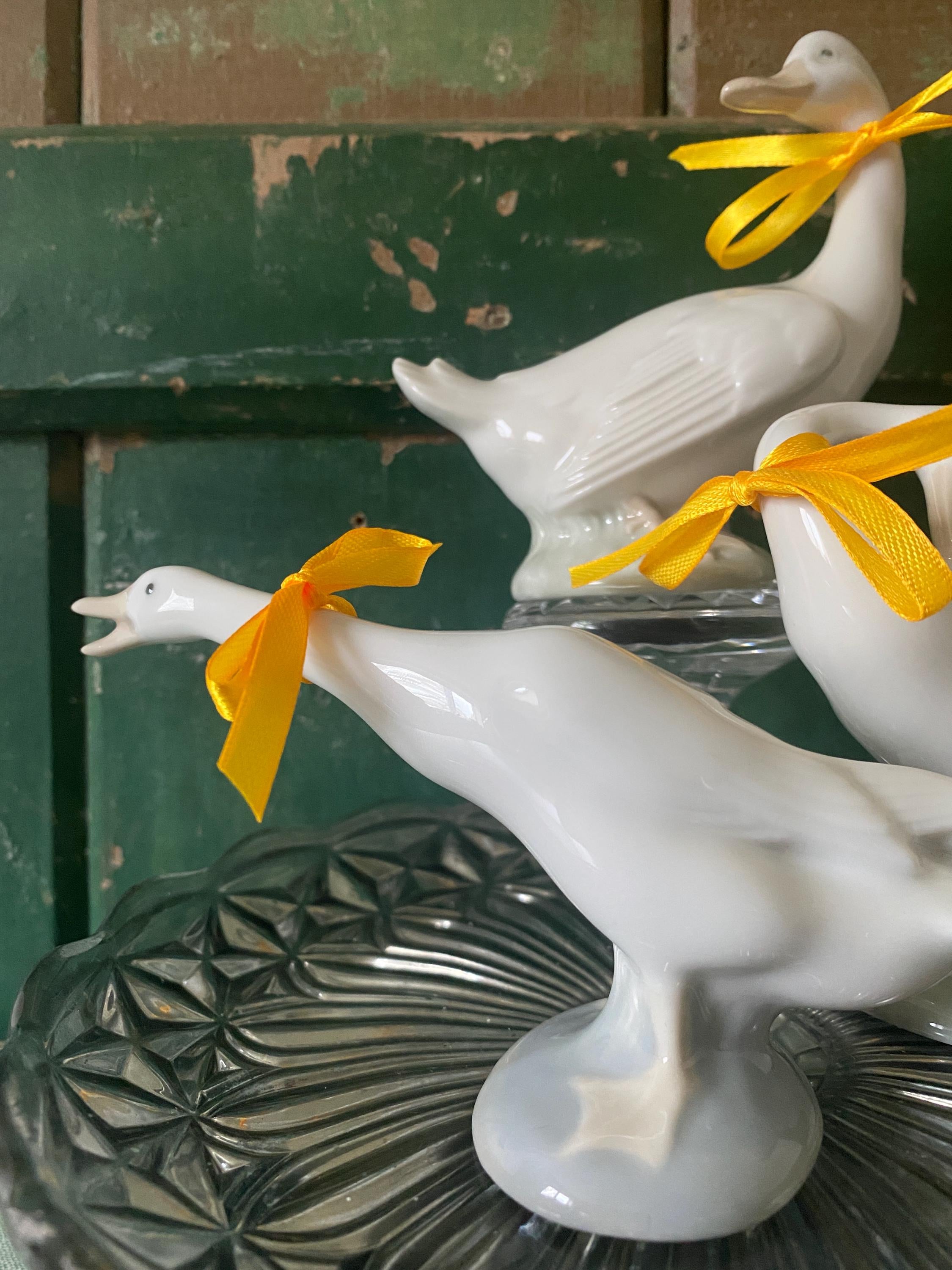 White porcelain goose figurines
