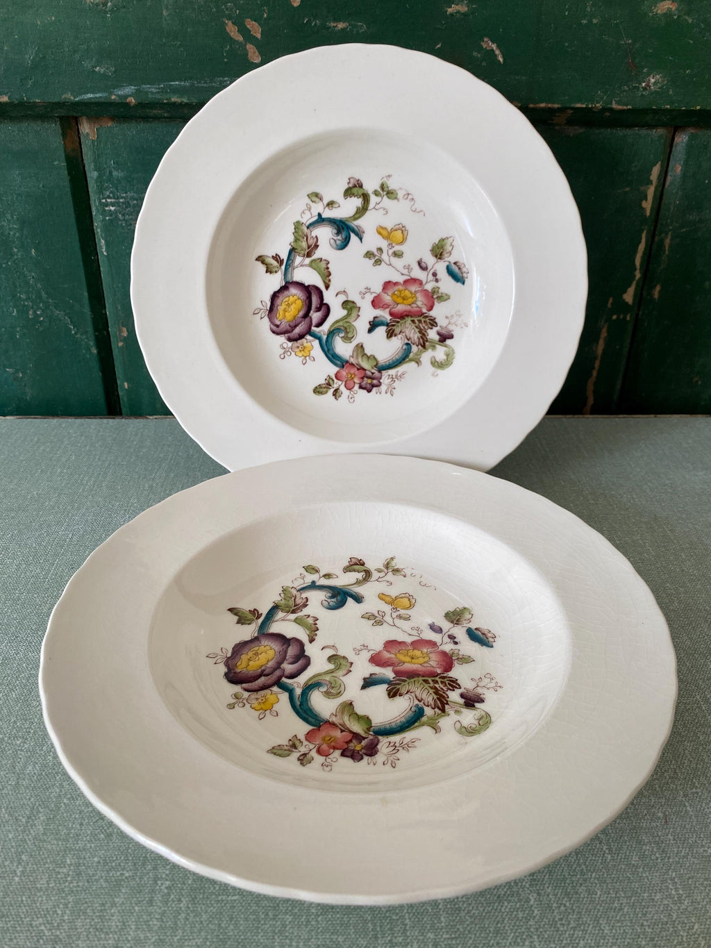 Two floral-patterned ceramic plates 