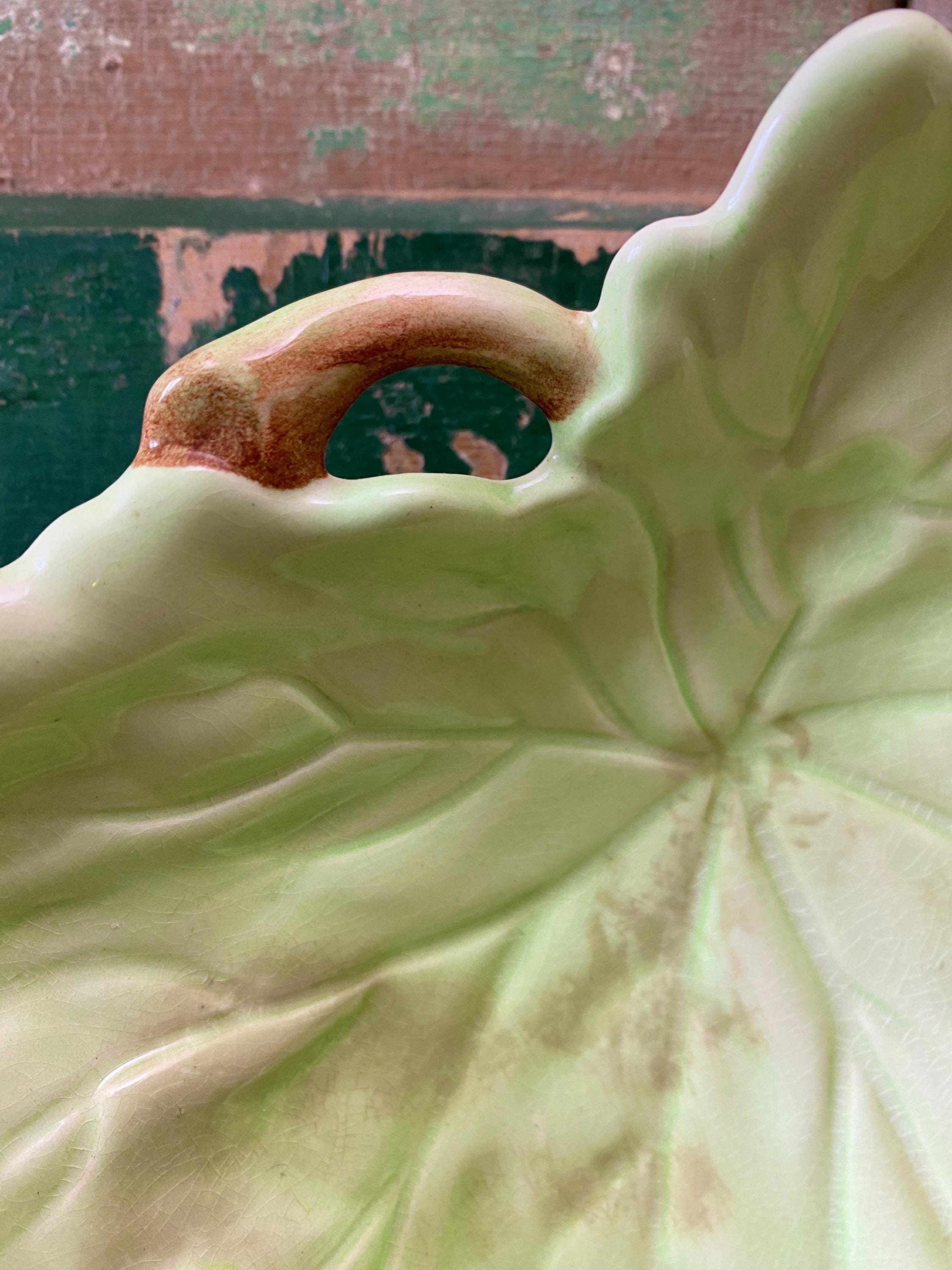 Close-up of a green ceramic leaf-shaped dish