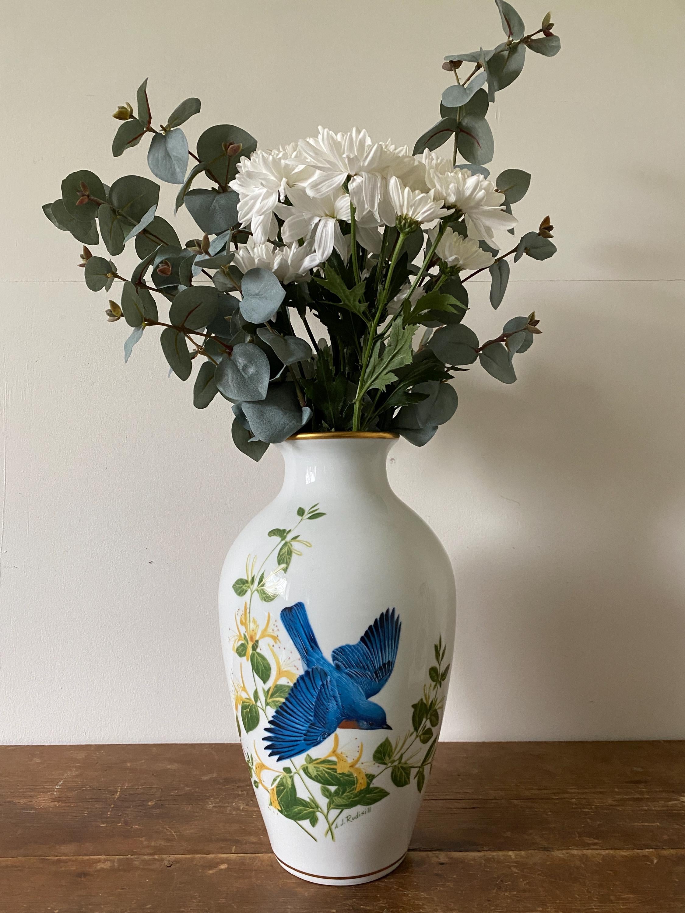 Vase with floral design and blue bird 