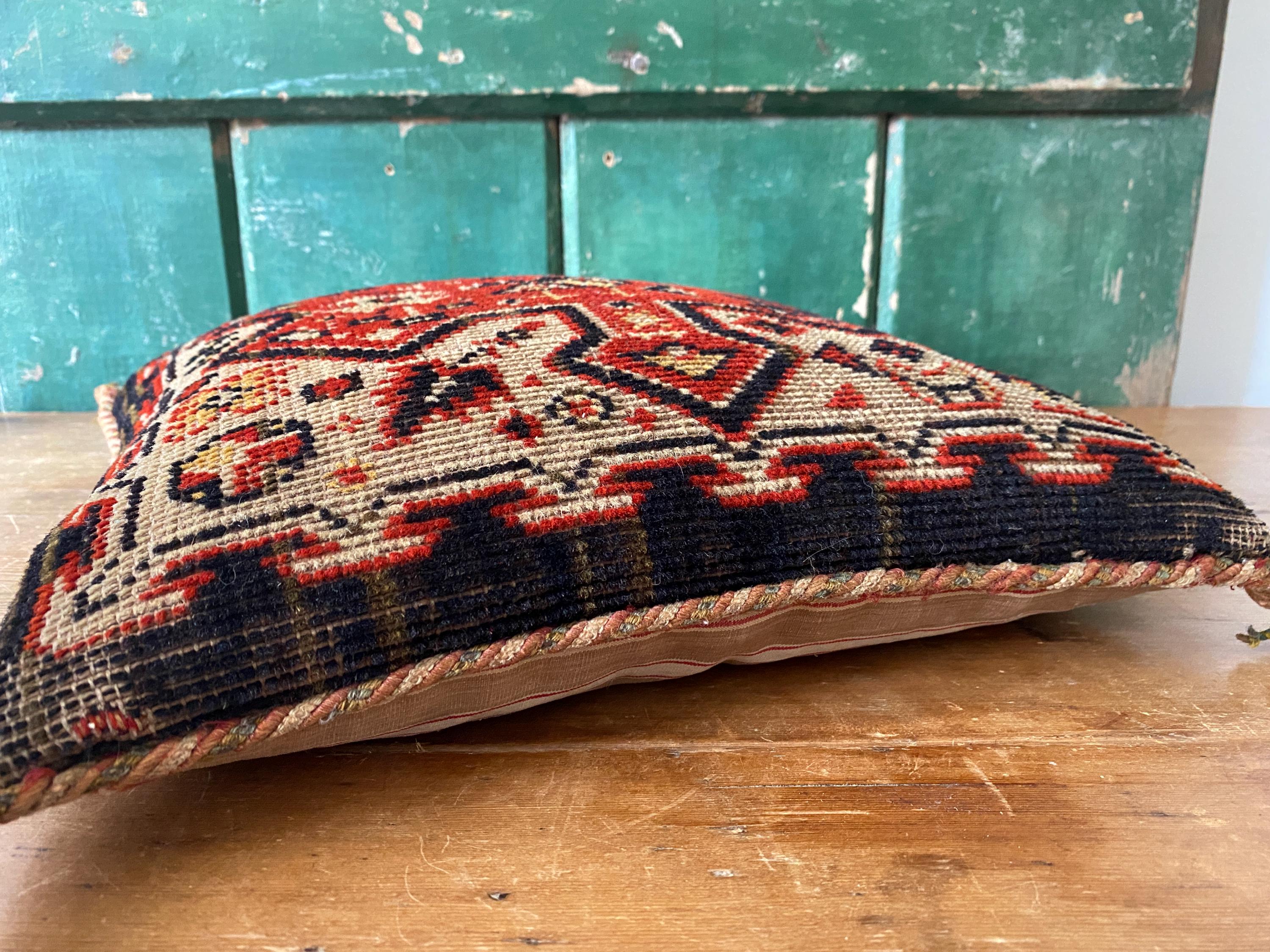 Decorative pillow with intricate woven patterns