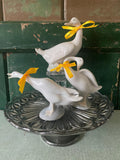 A group of ceramic geese figurines