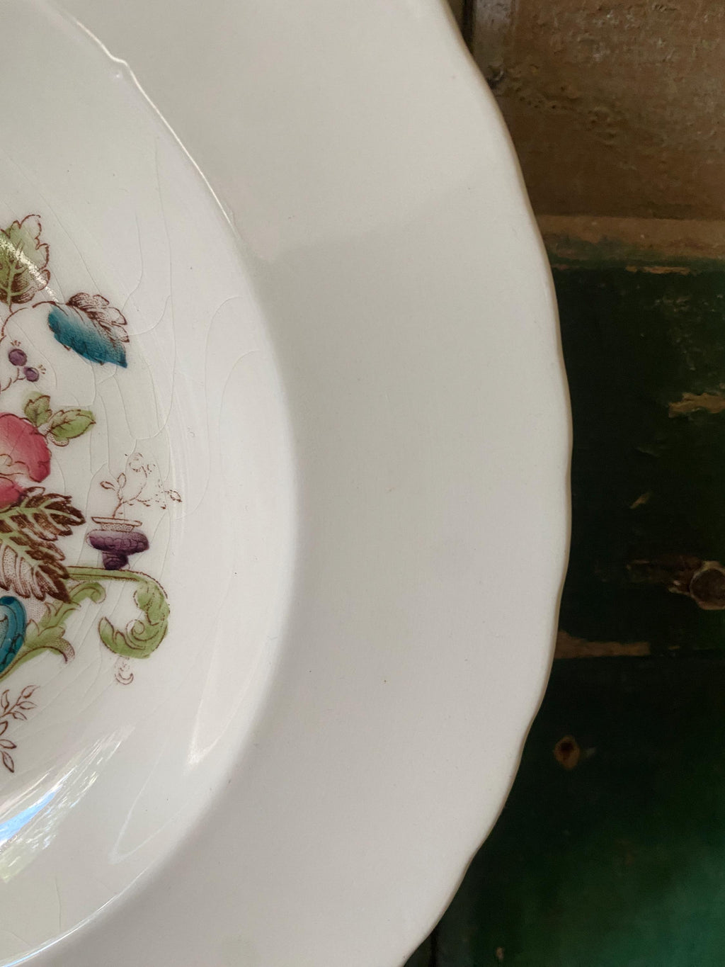 Decorative plate with floral patterns on a plain background