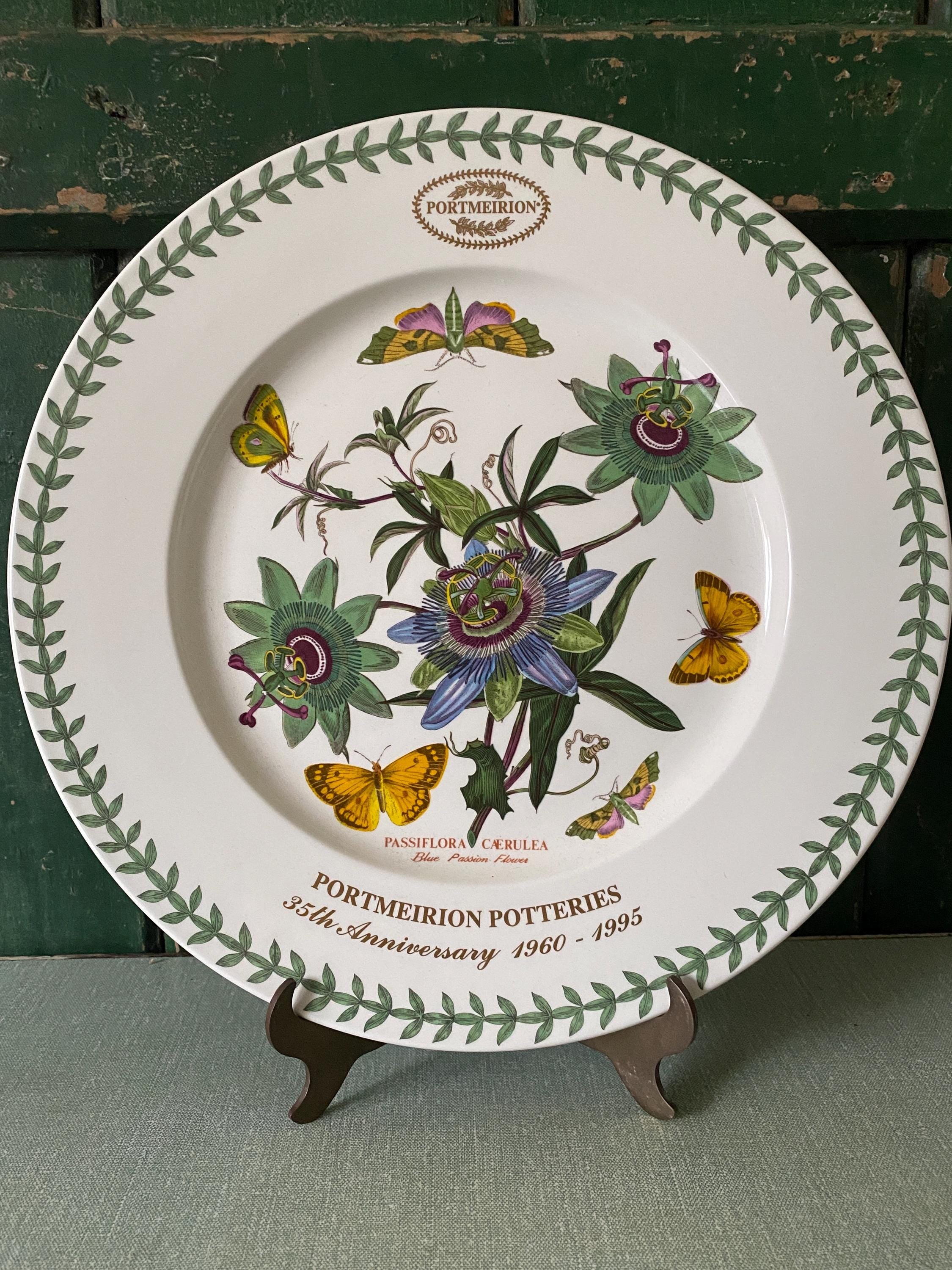 Decorative plate with floral and butterfly design made by Portmeiron