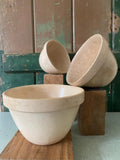 Three ceramic pudding bowls of different sizes 