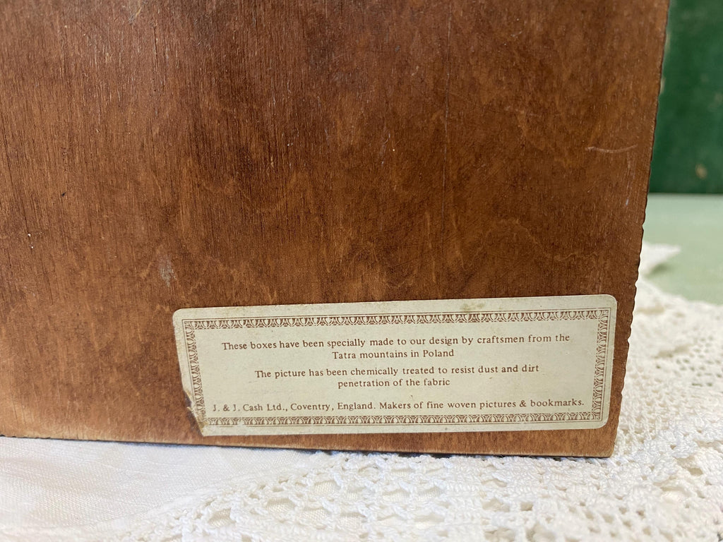 Wooden box with a maker's label showing J. J. Cash Ltd