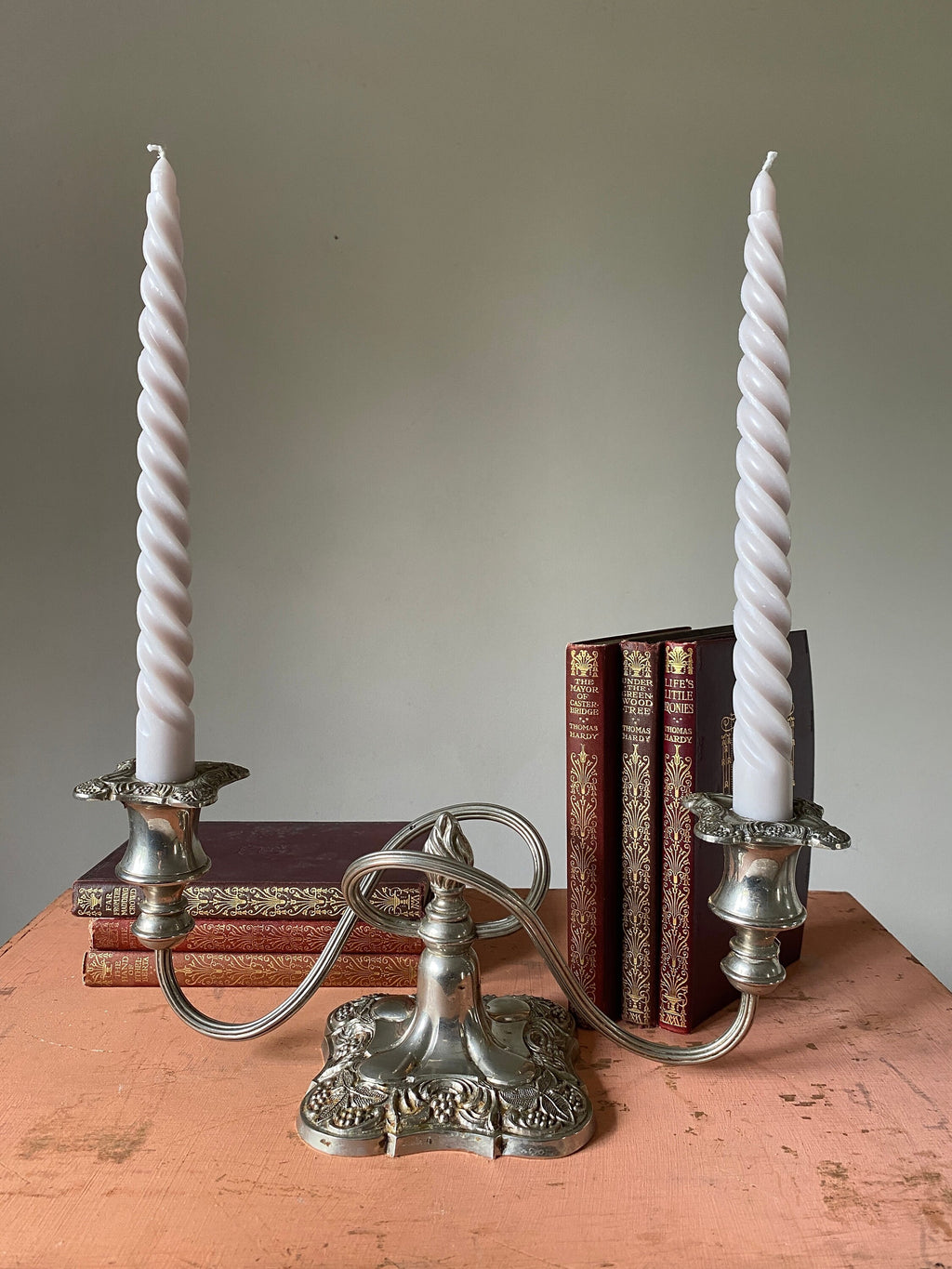 Vintage silver double candelabra with ornate square base