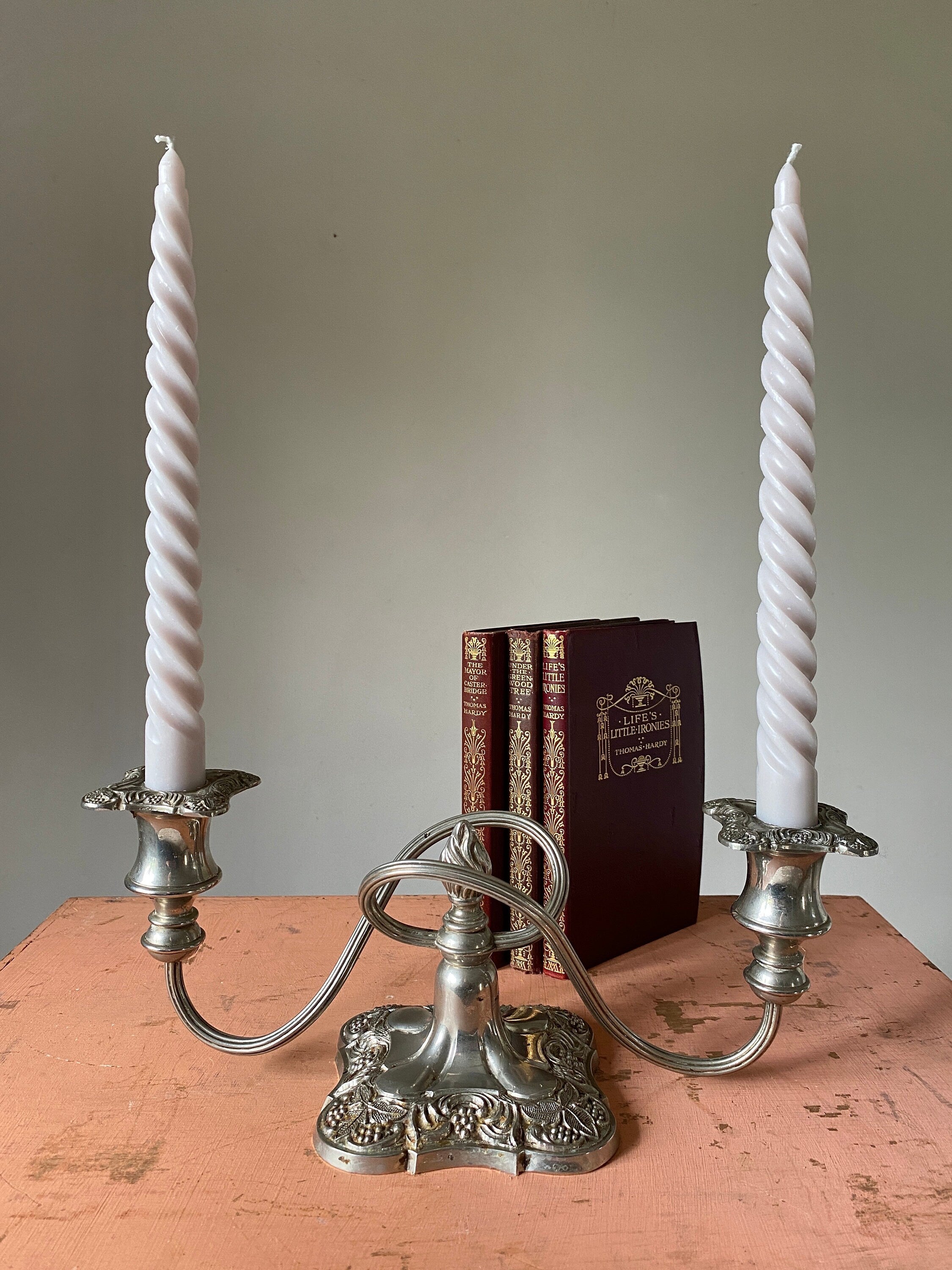 Vintage silver double candelabra with ornate square base