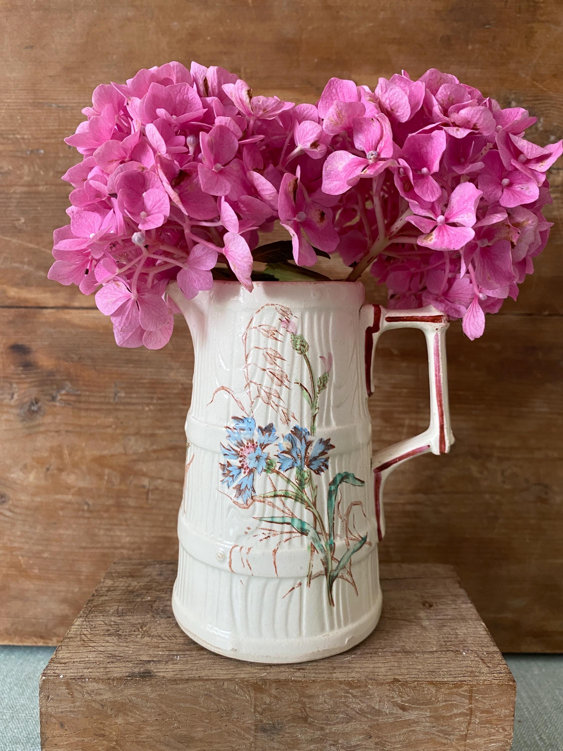 Small French jug with floral decoration