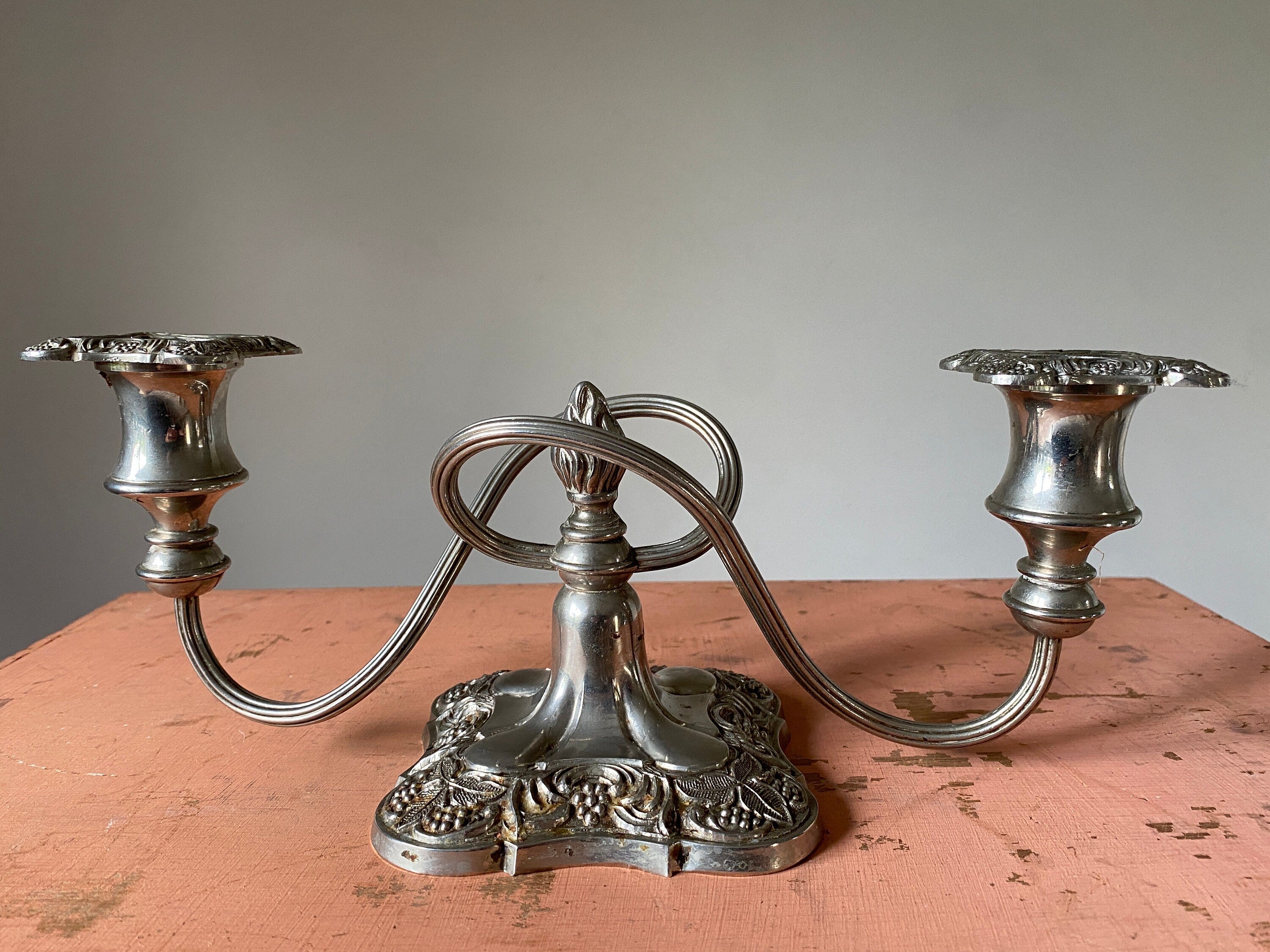 Vintage silver double candelabra with ornate square base