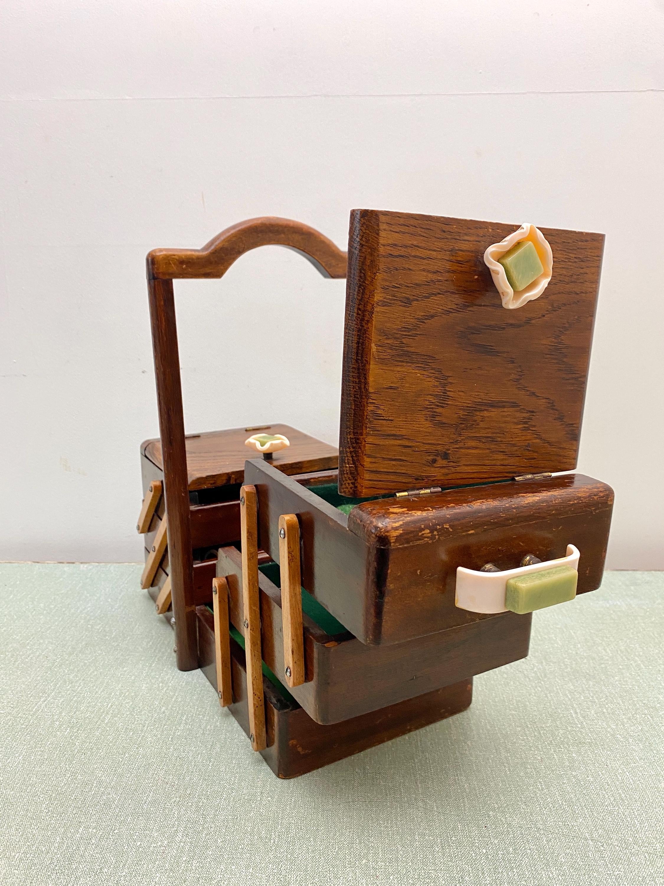Wooden expanding sewing storage box with Bakelite fixings