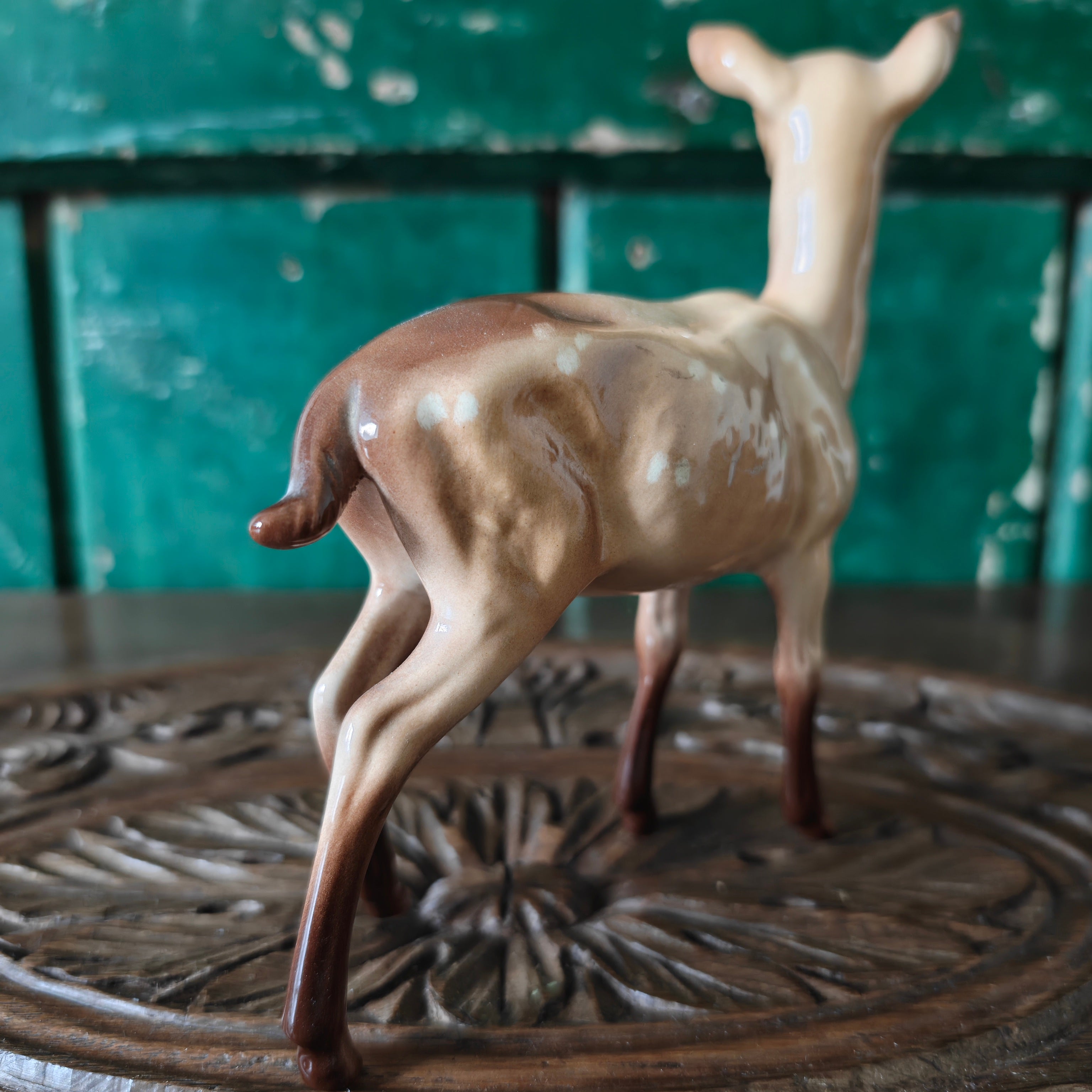 Rear view of a ceramic deer figurine 