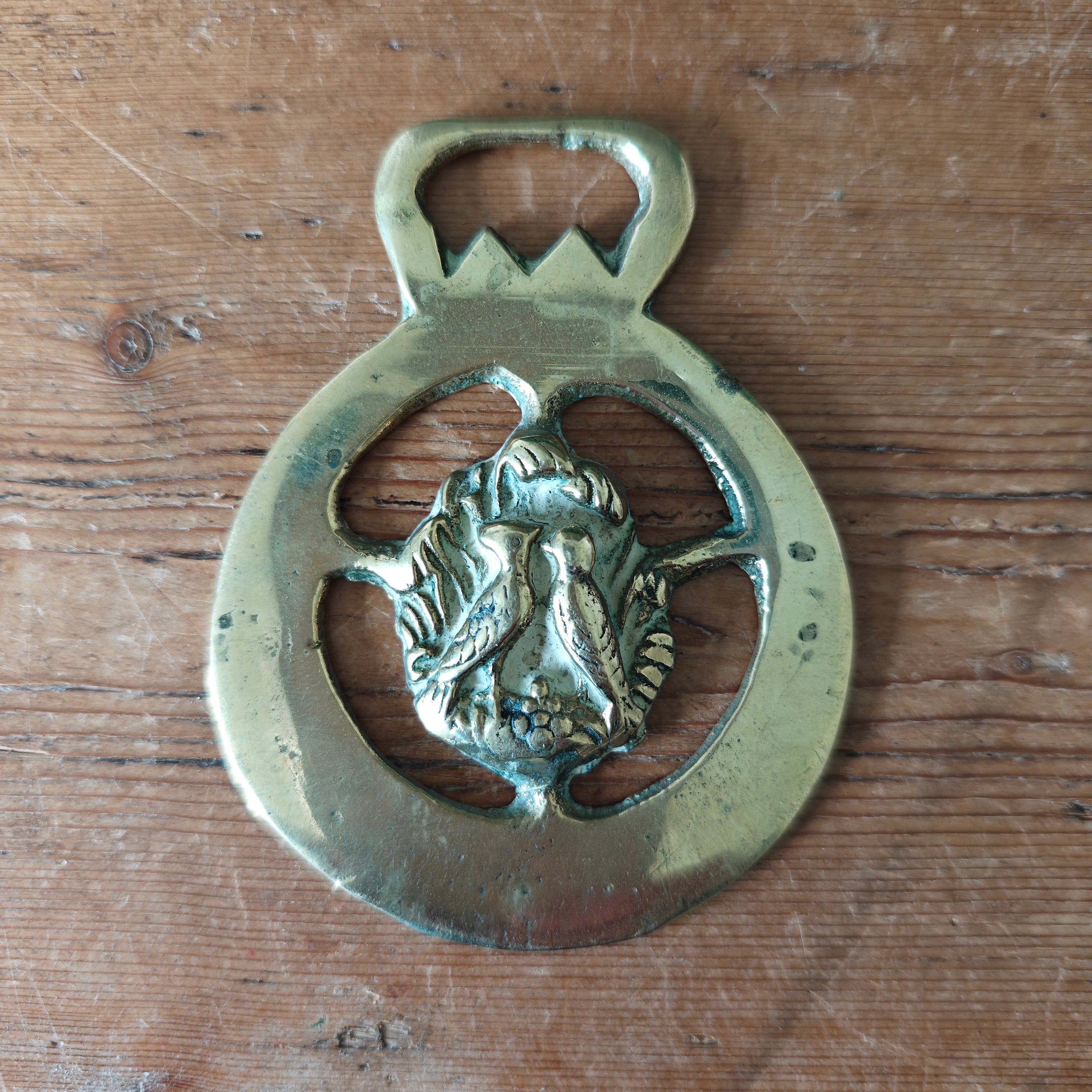 Horse brass with lovebirds