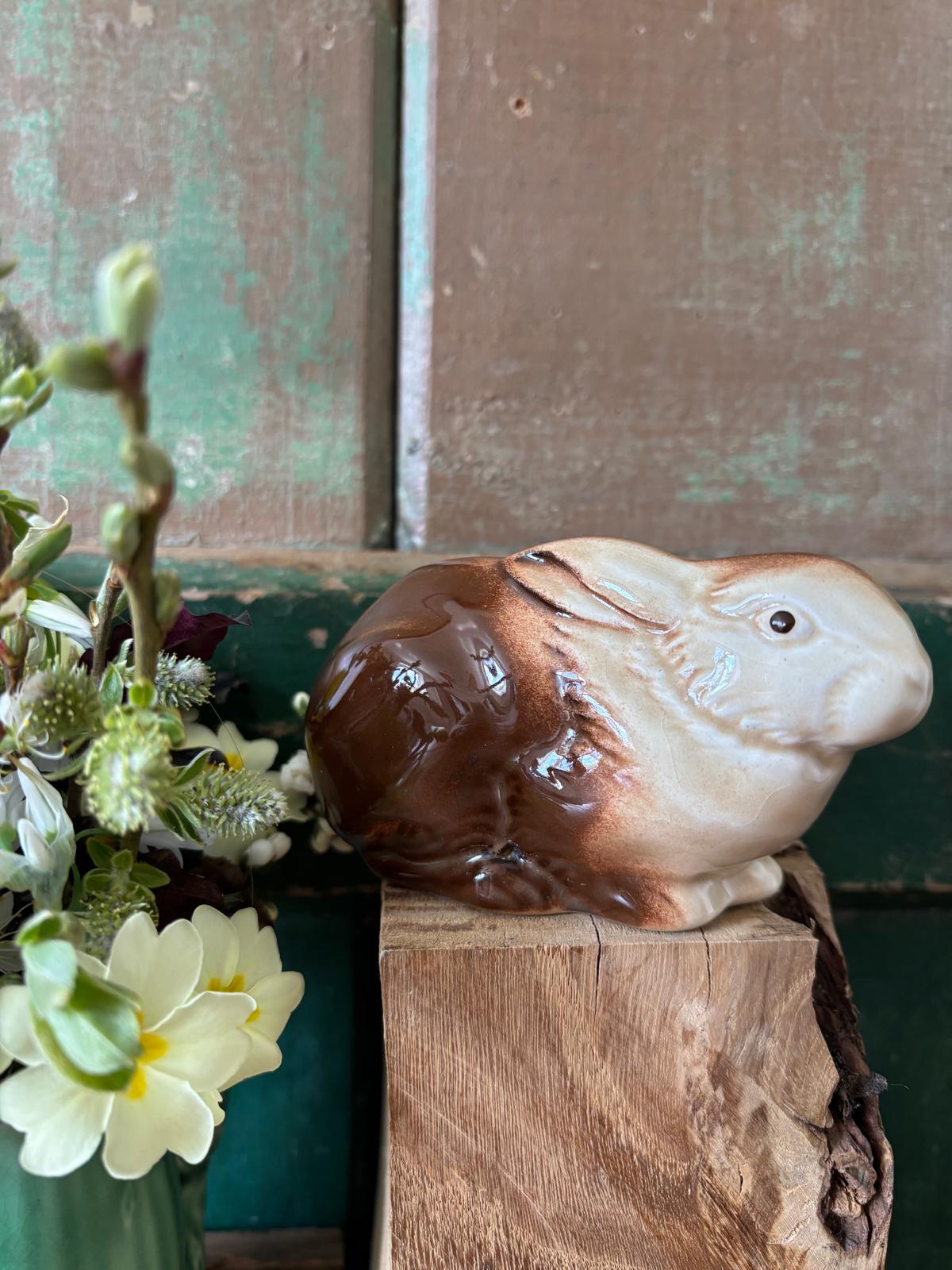 Ceramic rabbit figurine squatting