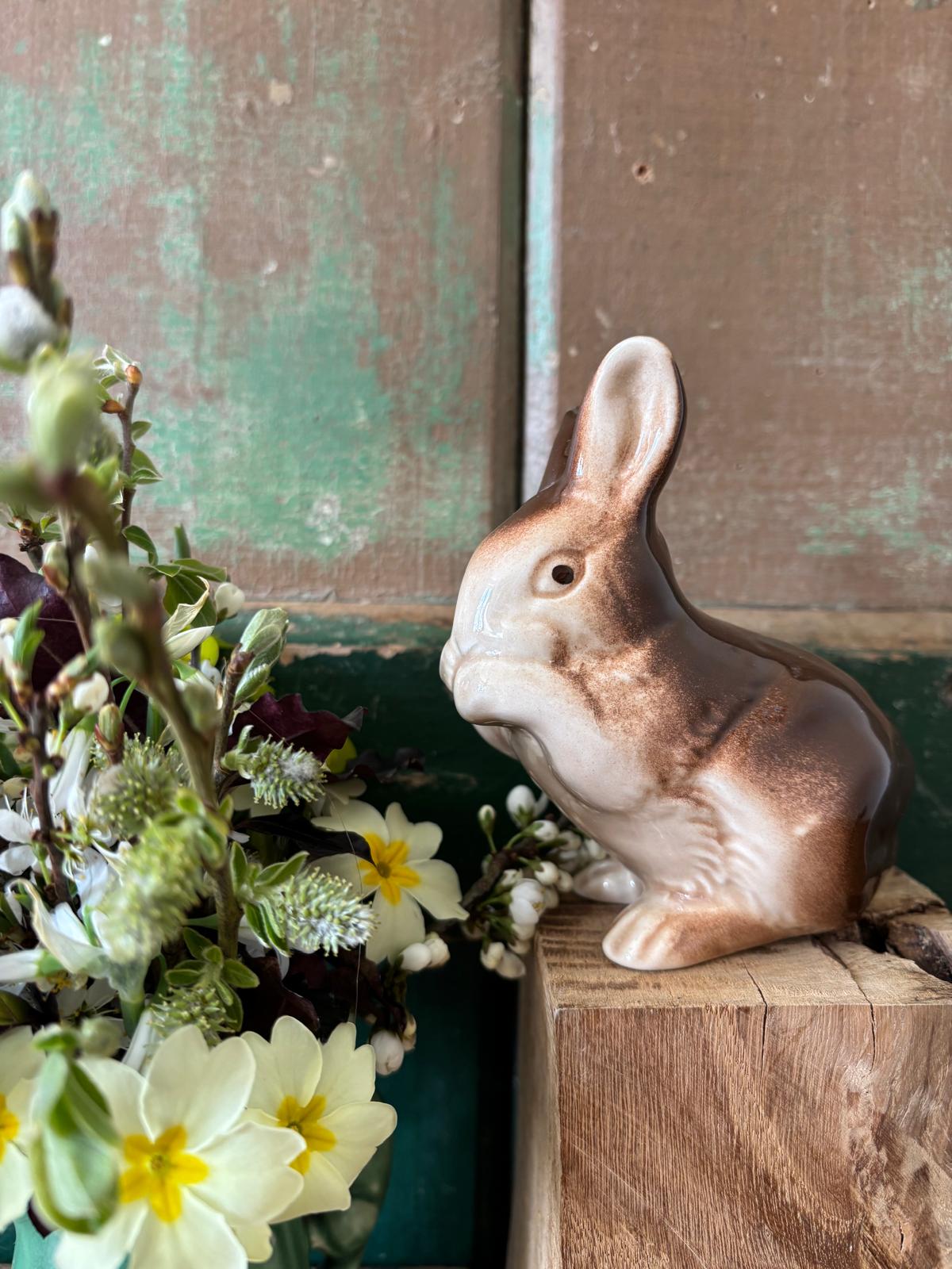 Ceramic rabbit figurine washing